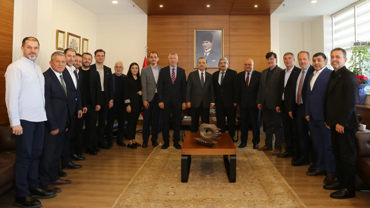 AK Partili Talus KOTO heyetini kutladı